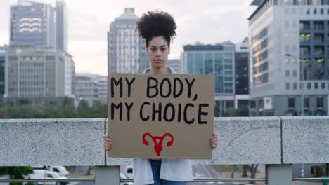 shot of a young woman protesting outside