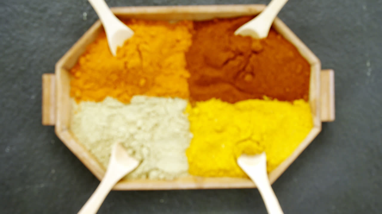 Various spices arranged in tray 4k