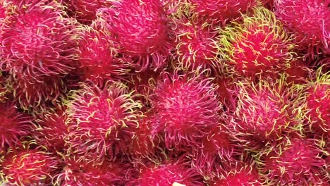 close-up view of a pile of fresh rambutans