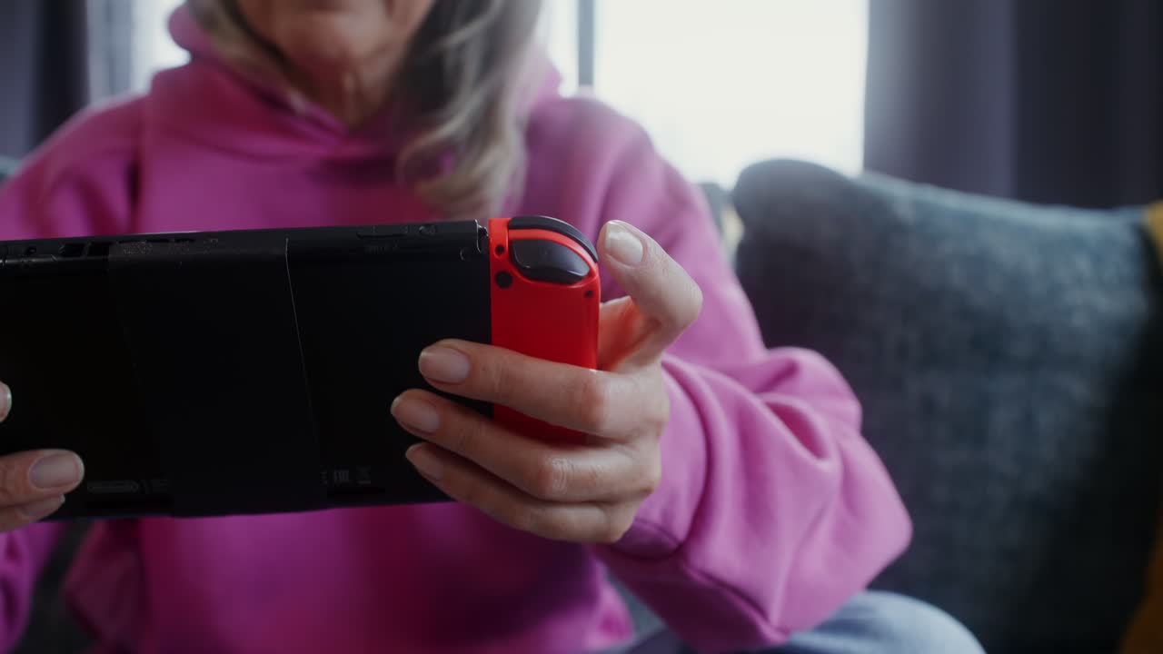 Woman Playing Nintendo Switch