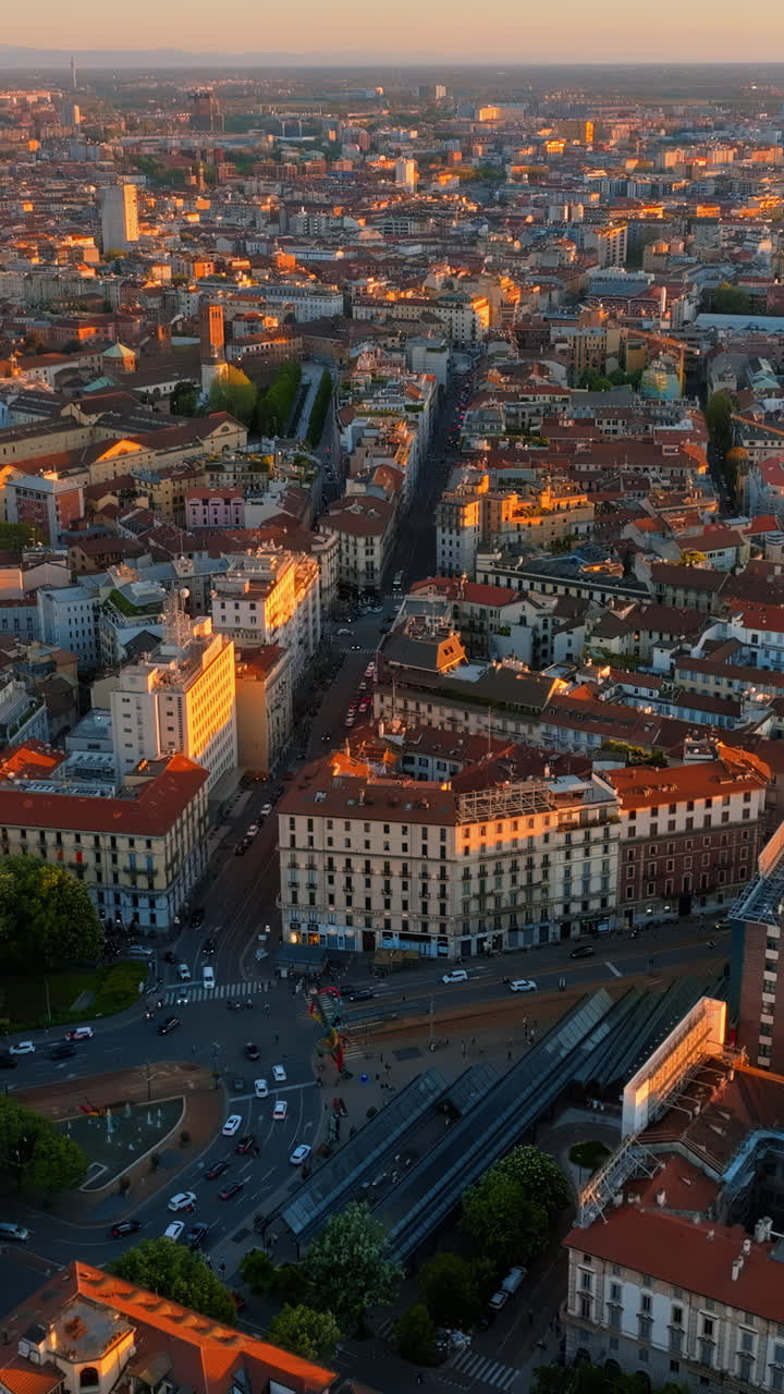 Aerial drone view of Sempione park in Milan, Italy on a sunny day. Vertical