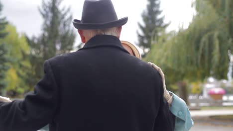 sweet senior couple dancing in the park sweet senior couple dancing in the park old european man and woman dancing together in park standing healthy lifestyle concept