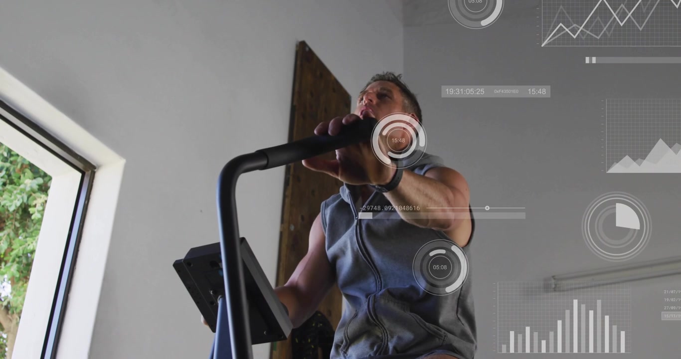 Man gripping bars and pedaling by window checking tablet HUD growing and tracking fitness stats