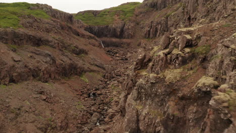 westfjords of iceland, tracking drone shot through rocks