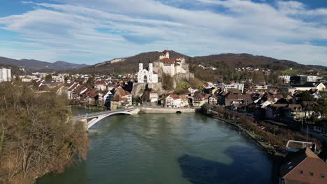 aarburg aargau switzerland swirling river in front of castle slow approach flight