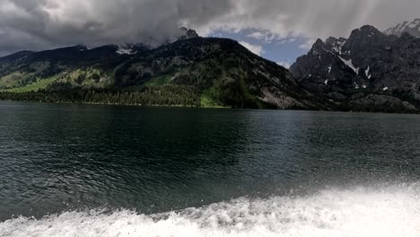 scenic boat tours on jenny lake, in grand teton national park, wyoming, usa. 4k passenger pov