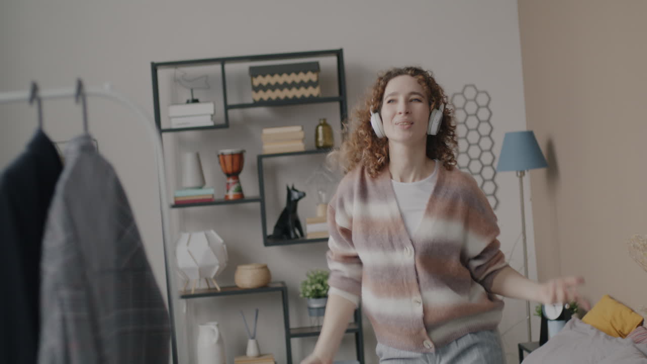 Woman Dancing in Her Bedroom