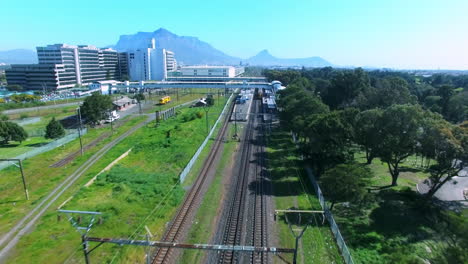 aerial view of a train station in a city