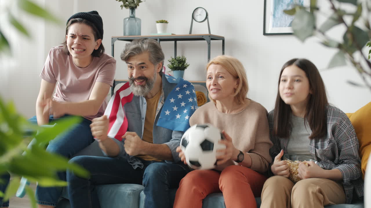 Family Watching a Soccer Game