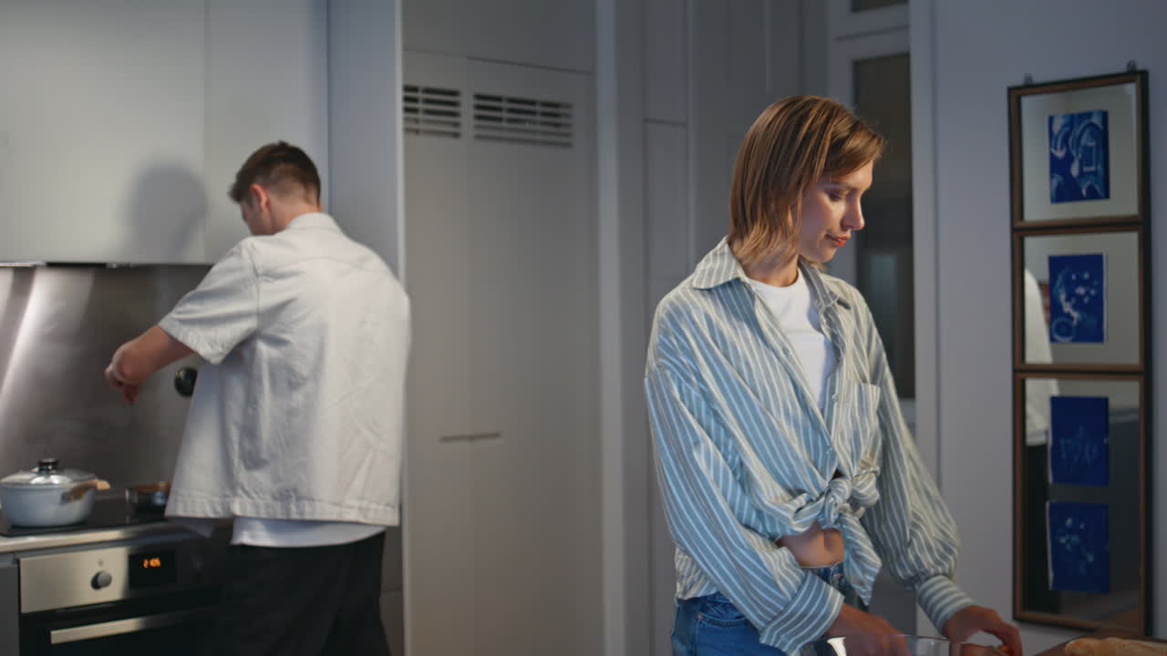 Young family resting kitchen on weekend. woman using computer online