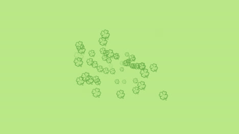 Digital-animation-of-multiple-clover-leaves-forming-against-green-background