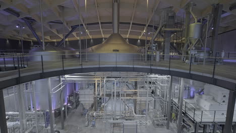 interior pipework, copper stills and mash tuns highlighting the architecture and complexity of a modern scottish whisky distillery