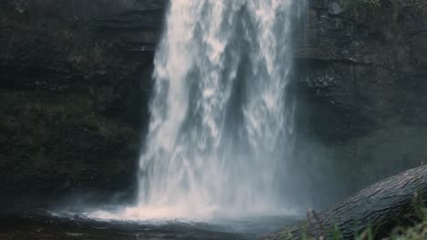 Cascading-Waterfall-with-Spray-and-Chopped-Down-Log-in-Wales-UK-4K