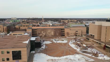 Aerial-panorama-of-University-of-Wisconsin,-Stevens-Point-campus-during-winter