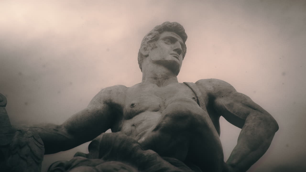 Epic, ancient stone statue on cloudy day and windy weather.