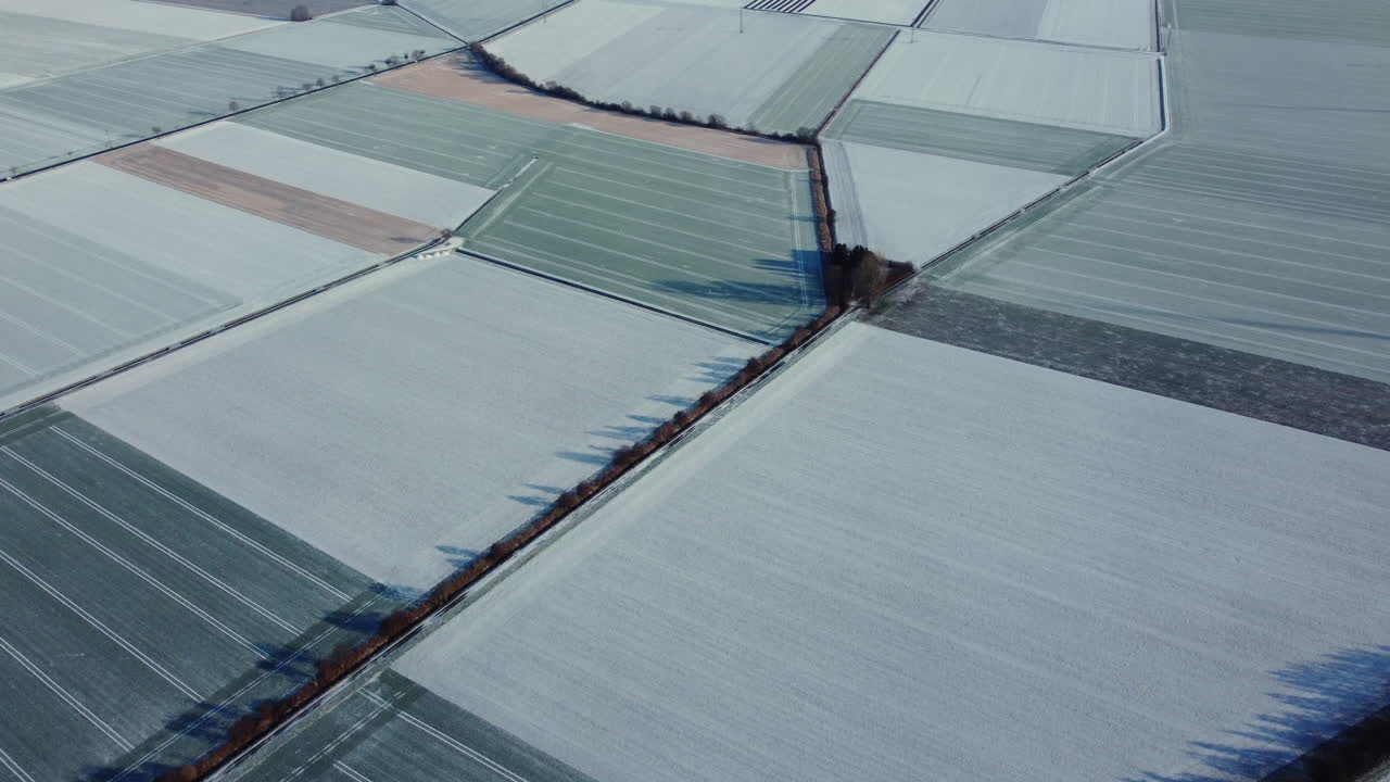 Snowy Farmland Aerial View