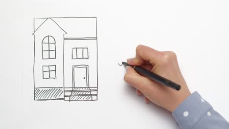 dibujar una casa y una familia con un bolígrafo en papel. lapso de tiempo.