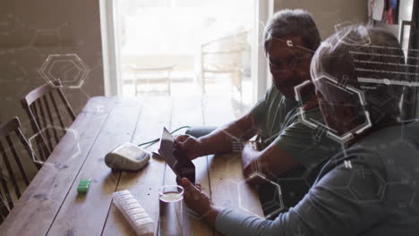 animación de la estructura química sobre una pareja de ancianos usando una tableta en una mesa de madera