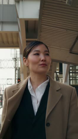 businesswoman walking in urban setting