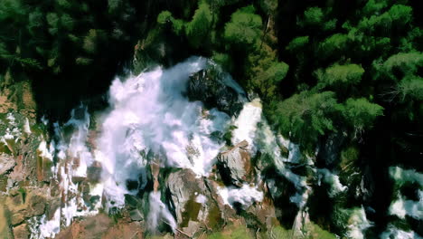 Straight-down-aerial-view-of-waterfalls-in-the-Norwegian-wilderness