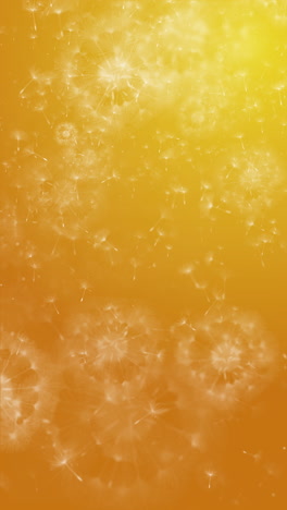 white silhouettes of dandelion seeds flying in the wind. looped summer animation on a yellow background. vertical video.