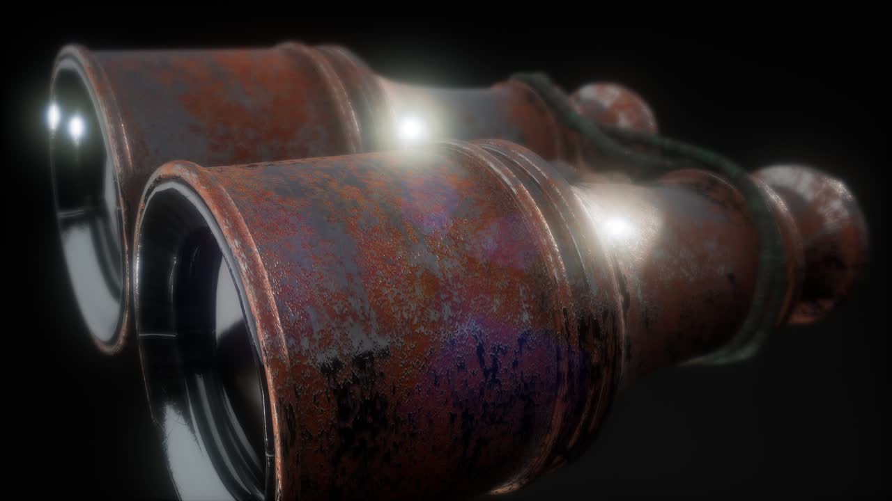 viejos binoculares sobre un fondo negro