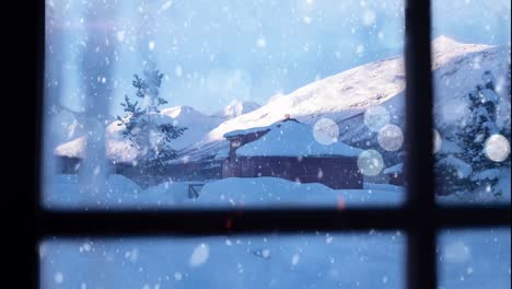 snowy winter scene with houses and mountains