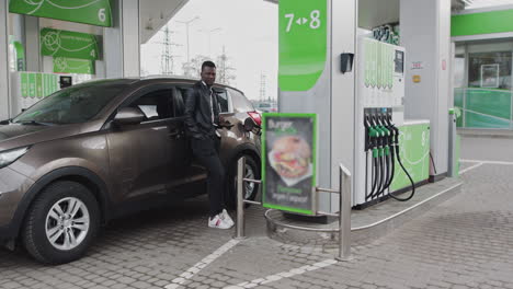 man at a gas station