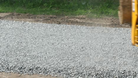excavator carries gravel in the bucket
