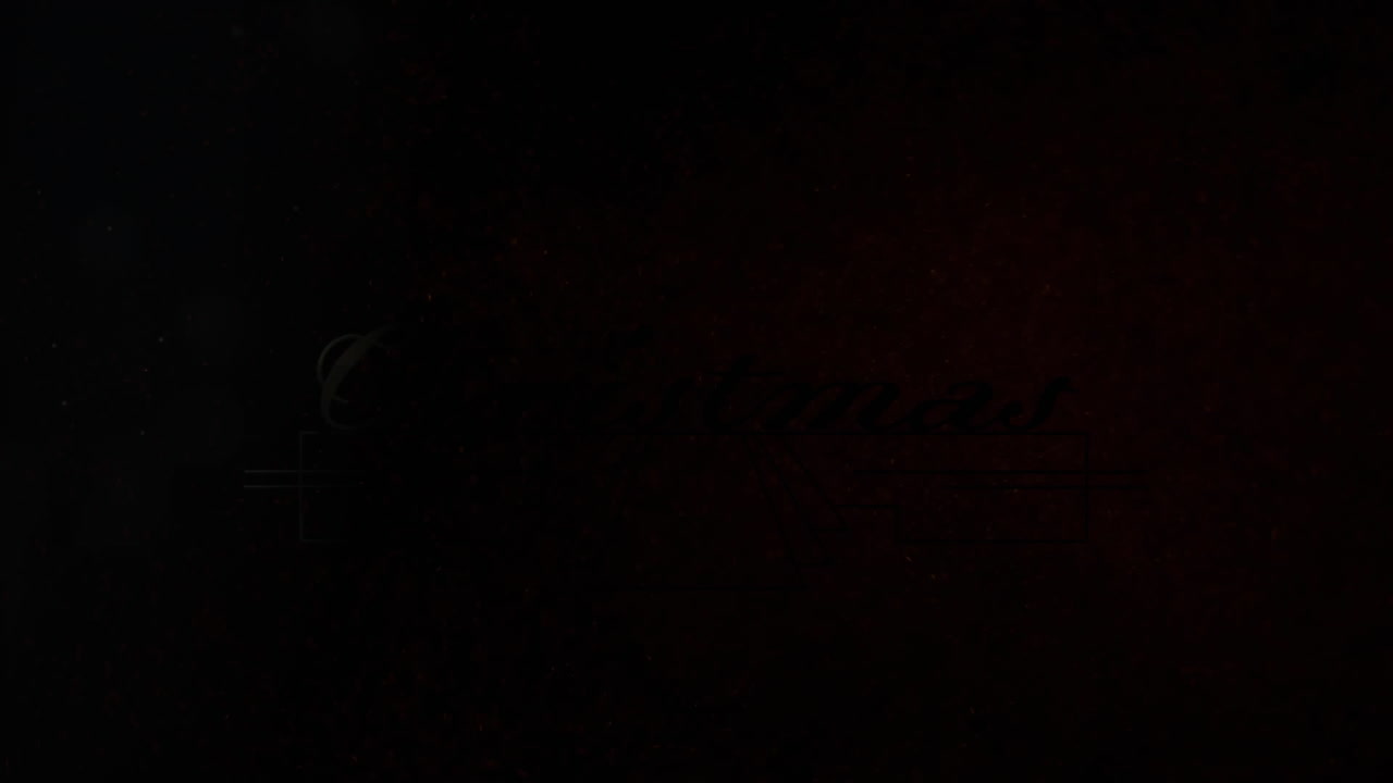 animación del texto de navidad sobre la decoración en fondo negro