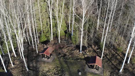 Roadside-picknick-shelters-in-Sweden,-shot-by-drone