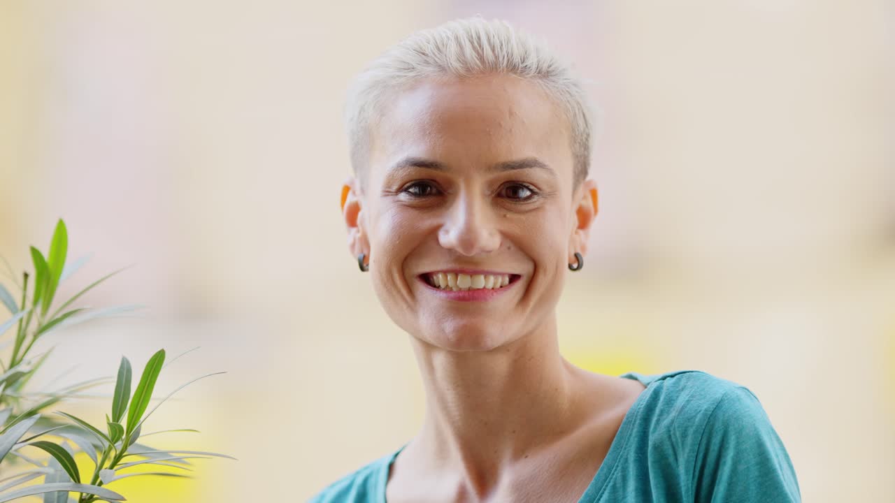 Close-up of a Cheerful Woman Laughing