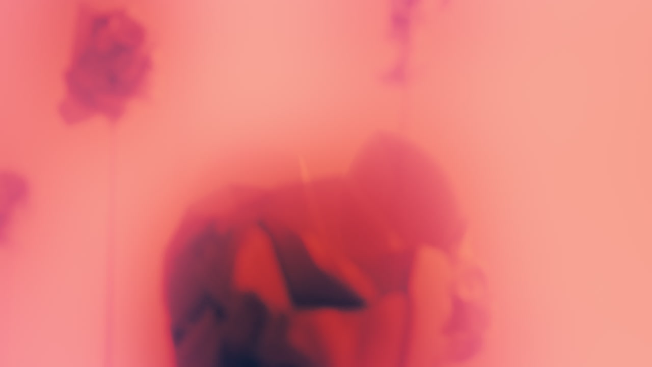 Destroyed android heads on spikes on the neon pink background