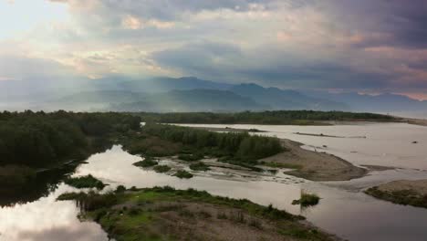 Flying-above-swamps,-lake-and-river-estuary-at-seashore-of-Black-sea,-Chorokh,-Batumi,-Georgia