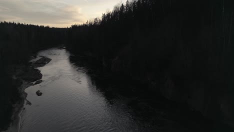 aerial view of a river landscape at sunset