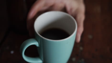 woman drinking coffee in a cozy setting