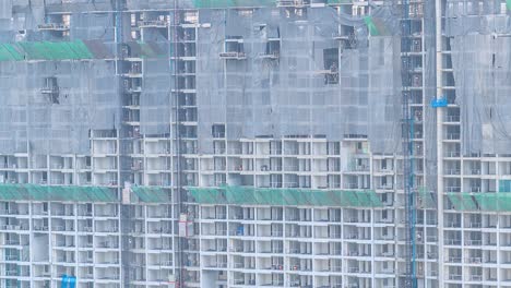 4k.time lapse construction site elevators at work