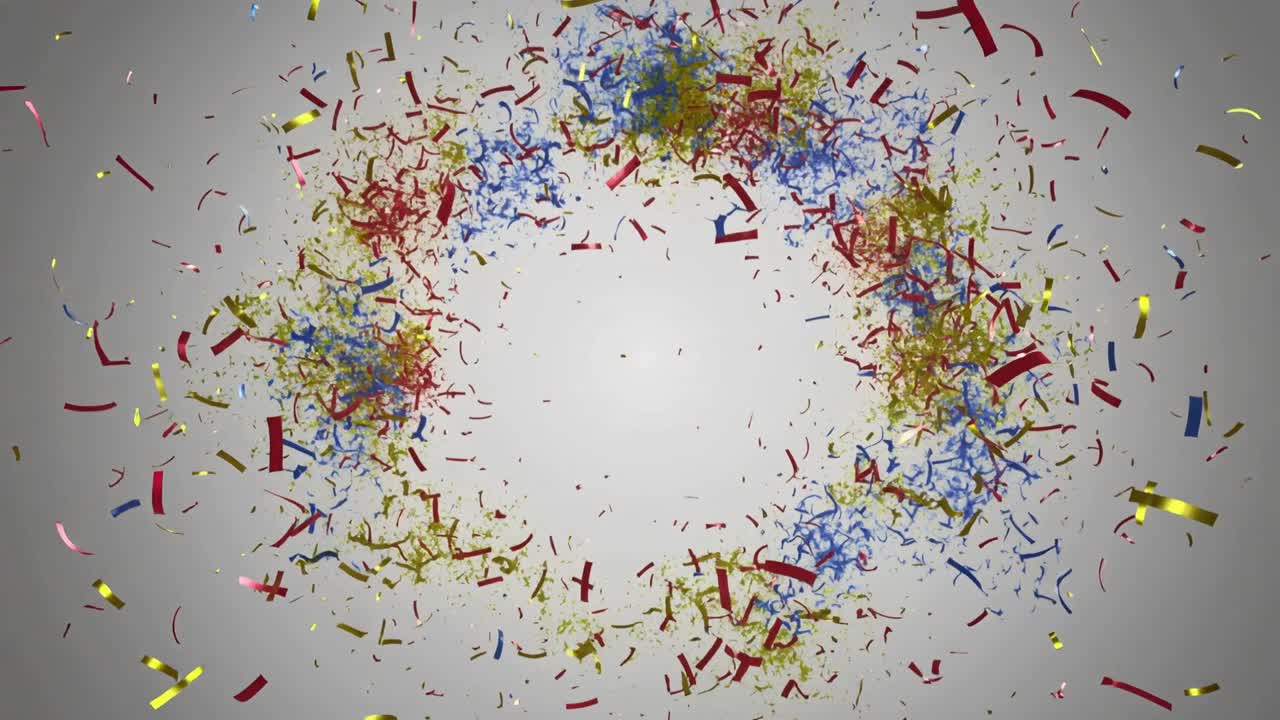Bursting wreath confetti assembly expanding outward on grey backdrop, with red blue yellow ribbons