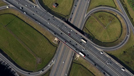aerial. road traffic in city at summer time.