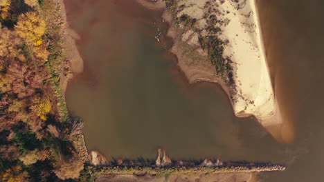 Aerial View of a River with Sandbar and Autumn Foliage