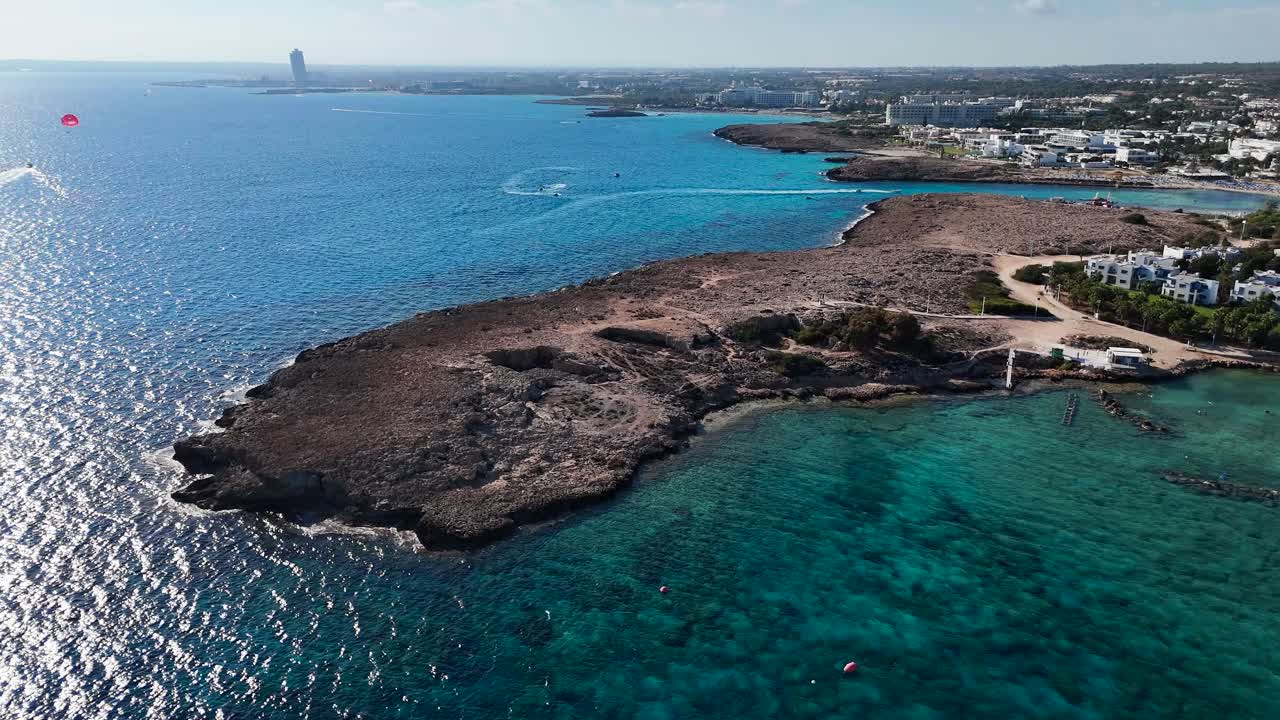 Aerial - turquoise water Mediterranean sea washes on Cyprus island shore