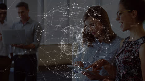 animation of network of connections with globe over caucasian business people in office