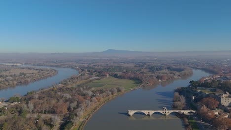 meandering rhône and avignon's ancient bridge - aerial view