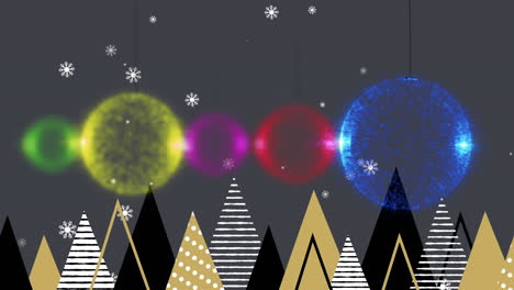 animation of snow falling over christmas tree ornaments