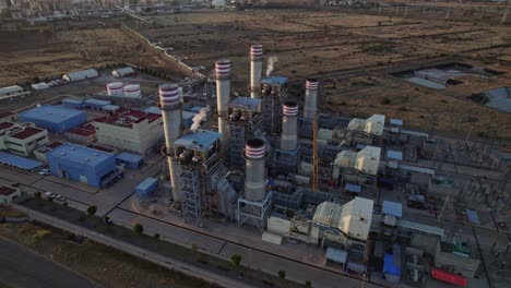 Aerial-sunset-shot-of-a-power-plant