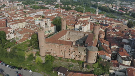 aerial orbit shot over ivrea castle