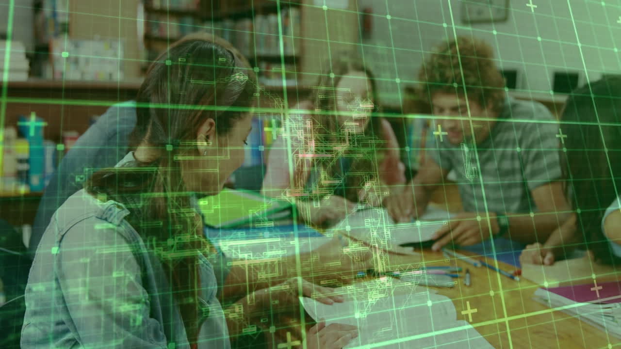 In school, students collaborating at table with digital grid animation overlay