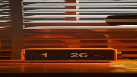 retro orange flip clock on desk