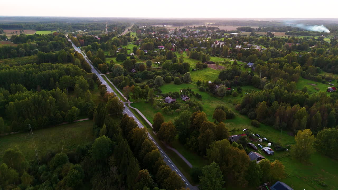 Rural Countryside Farming Village In Latvia, Northeastern Baltic Region Of Europe.