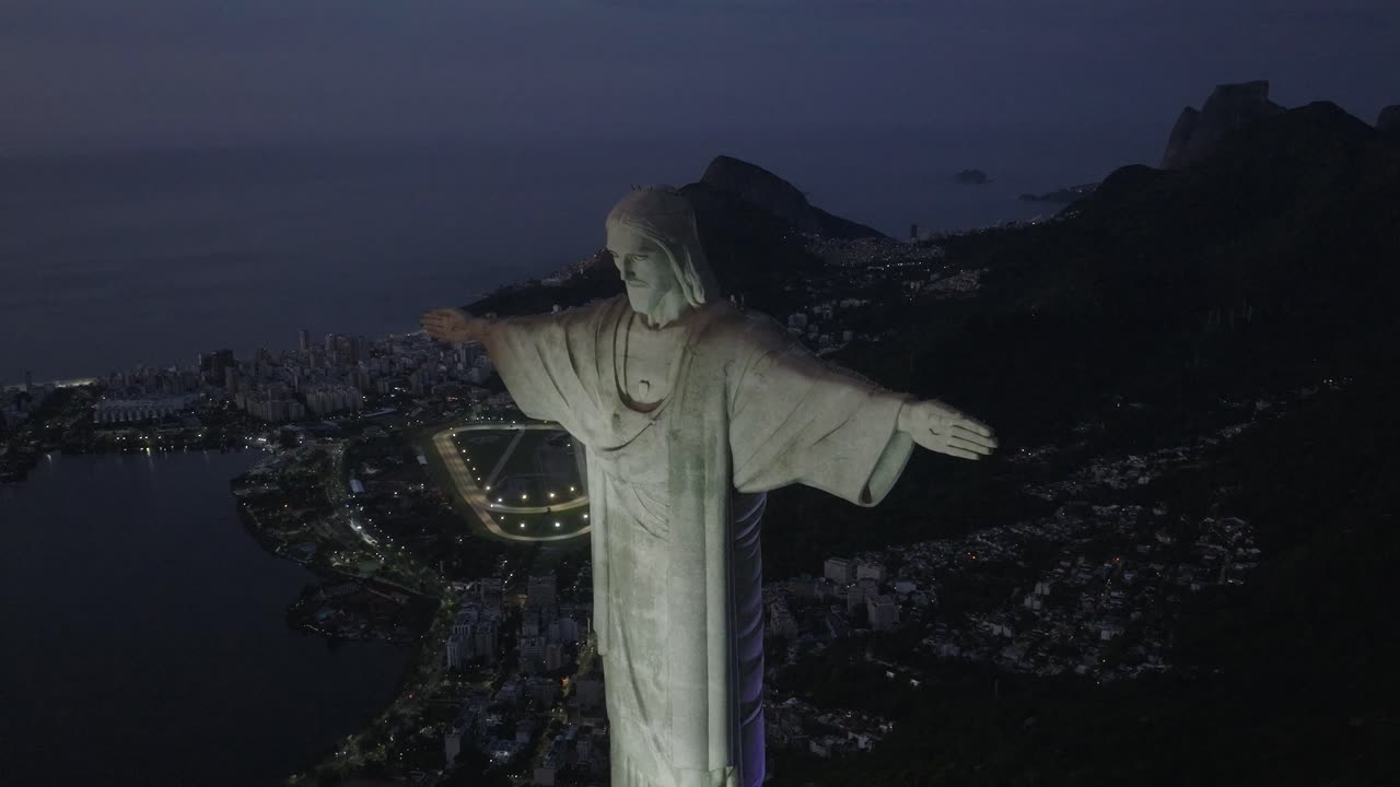 Christ the redeemer at dusk, rio de janeiro, brazil, aerial view